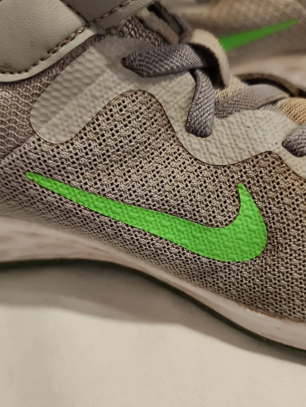 Nike Kids Gray Sneakers with Green Swoosh